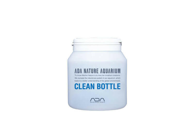 Front view of ADA Clean Bottle for aquarium maintenance, featuring minimalist white design with bold blue and black labeling